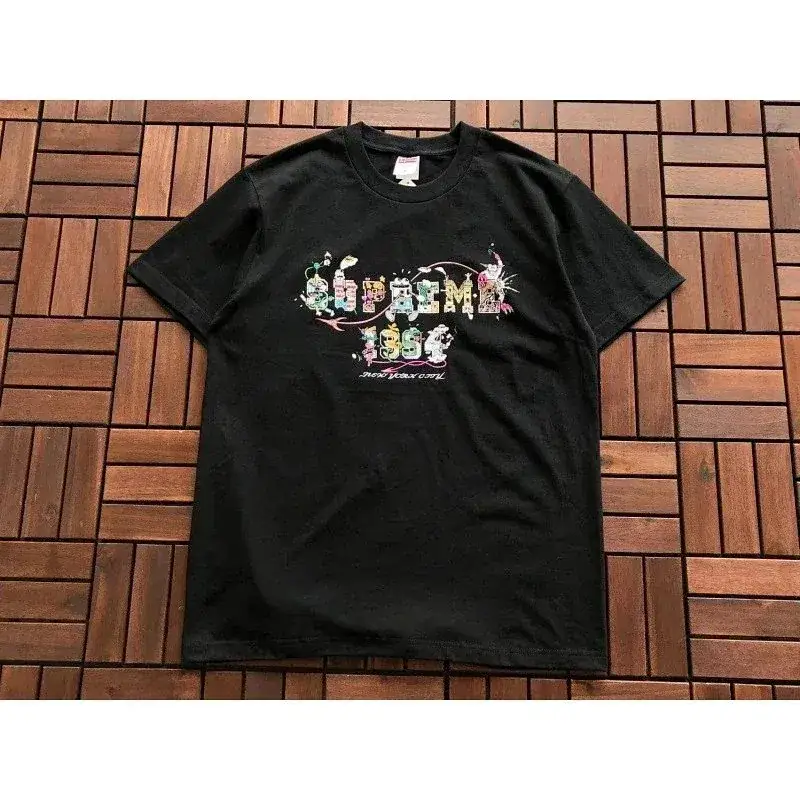 Supreme T-Shirt featuring a cartoon-style graffiti design