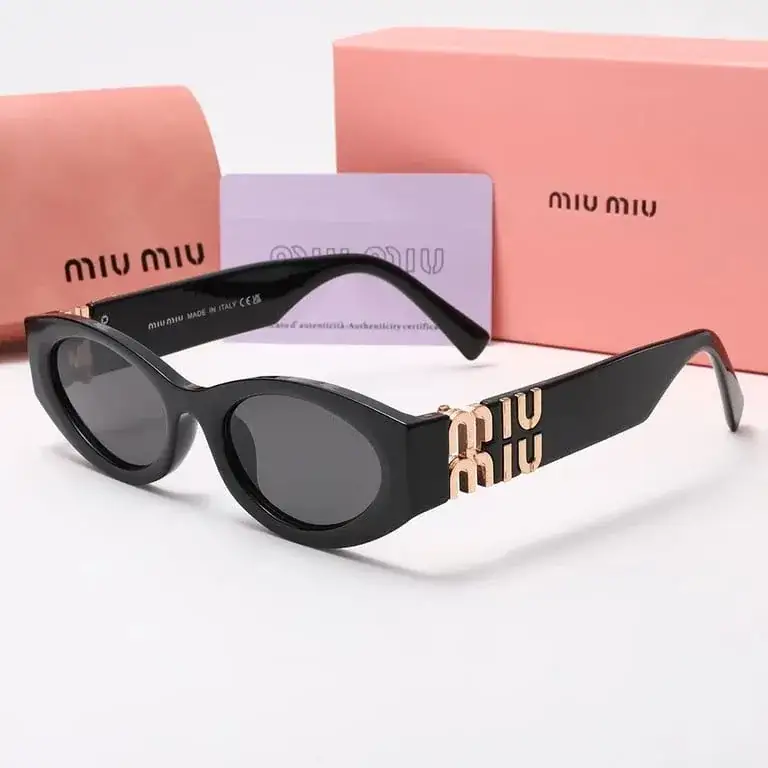 Miu Miu Oval Sunglasses