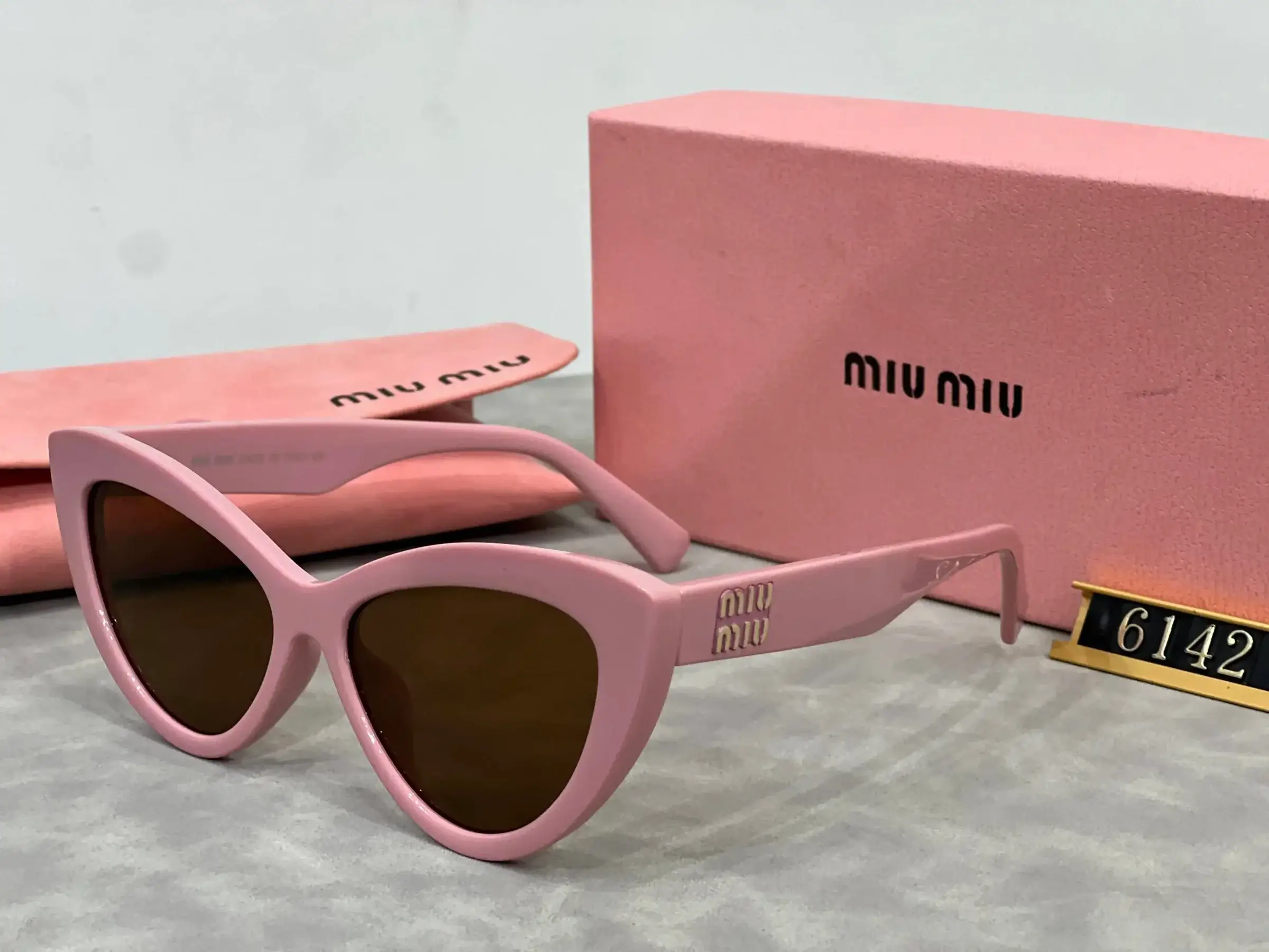 Miu Miu Cat Eye Sunglasses Pink