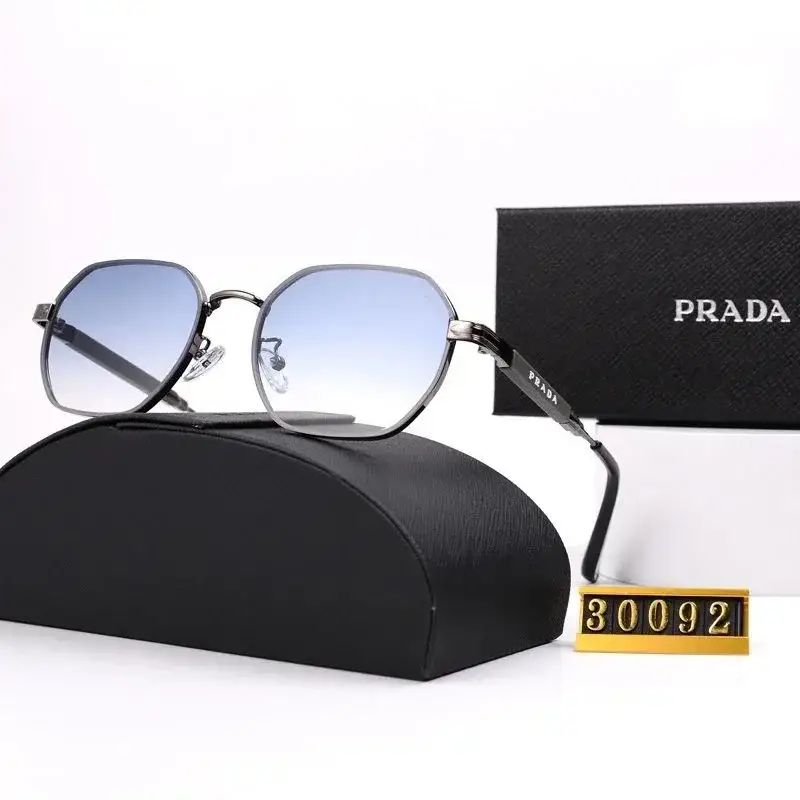 Prada Hexagonal Gunmetal Sunglasses with Blue Gradient Lenses