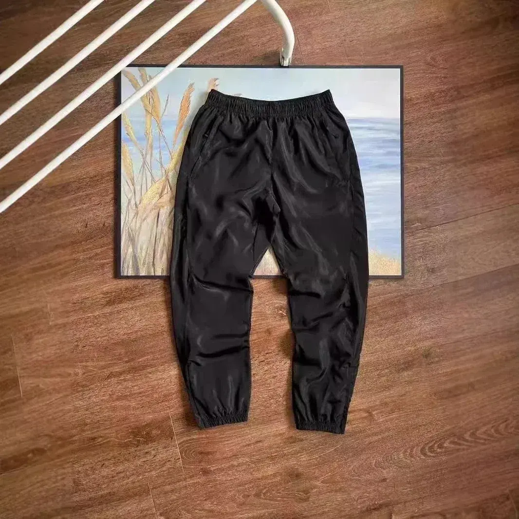 Prada-style nylon jogger pants