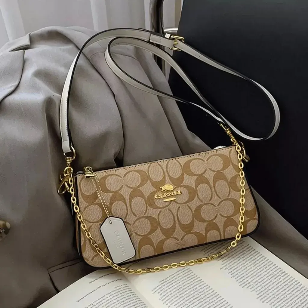 Coach classic monogram mahjong bag