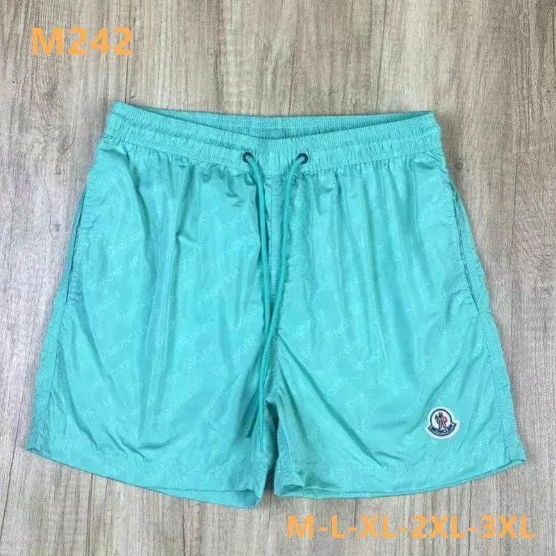 Moncler All-Over Logo Swim Shorts Mint Green