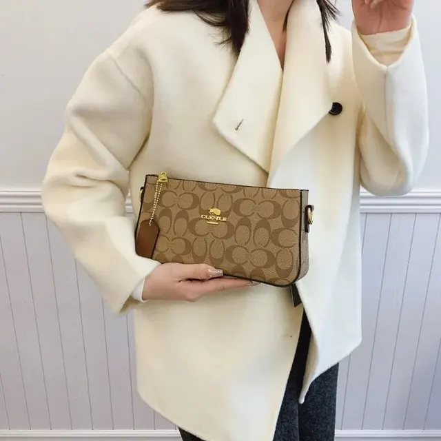 Coach classic monogram mahjong bag