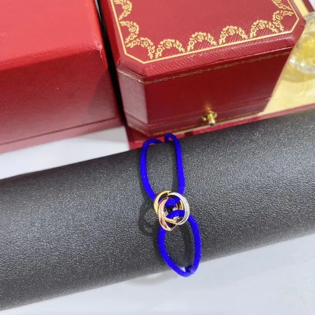 Cartier tricolor three-ring blue cord bracelet