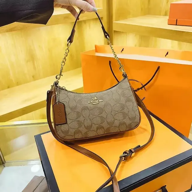 Coach classic monogram crescent-shaped underarm bag