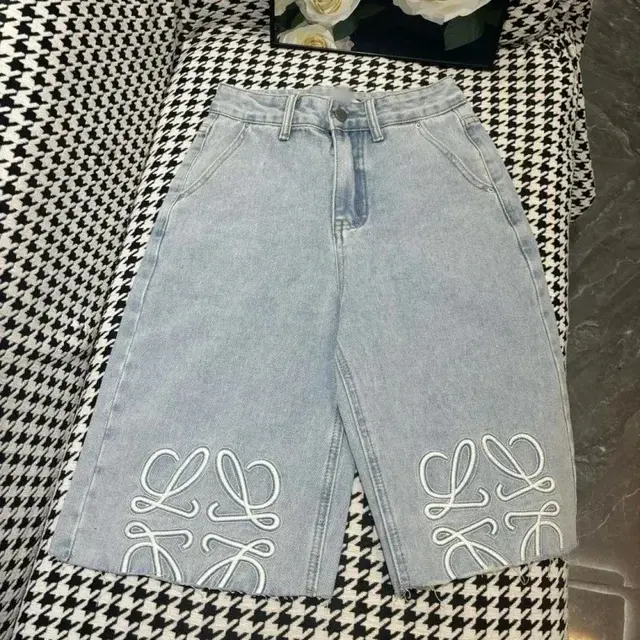Loewe-style Anagram embroidered denim shorts