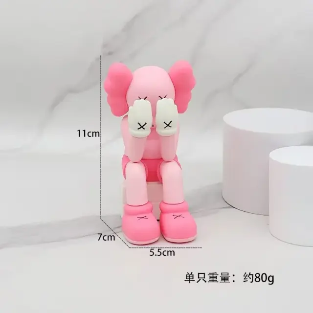 KAWS Sitting Figure Pink White