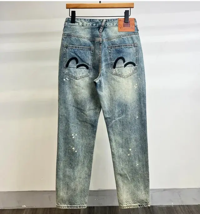 EVISU Seagull Print Paint Splatter Jeans Light Blue