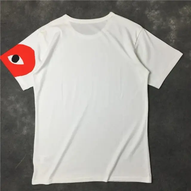 White sleeved red heart