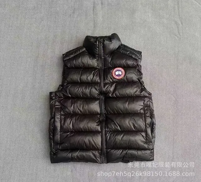 Black vest with a red label
